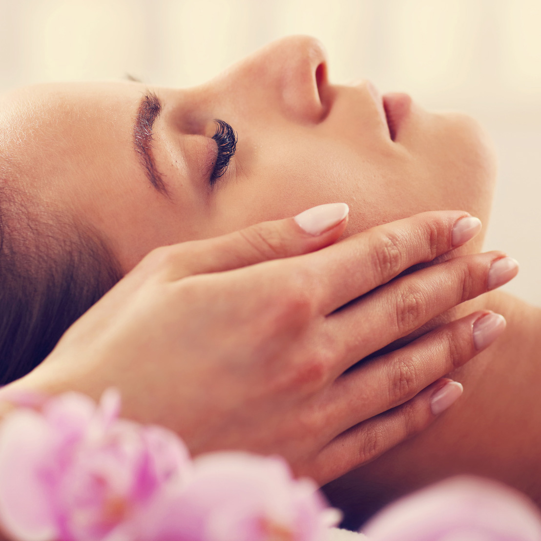 Beautiful woman getting massage in spa